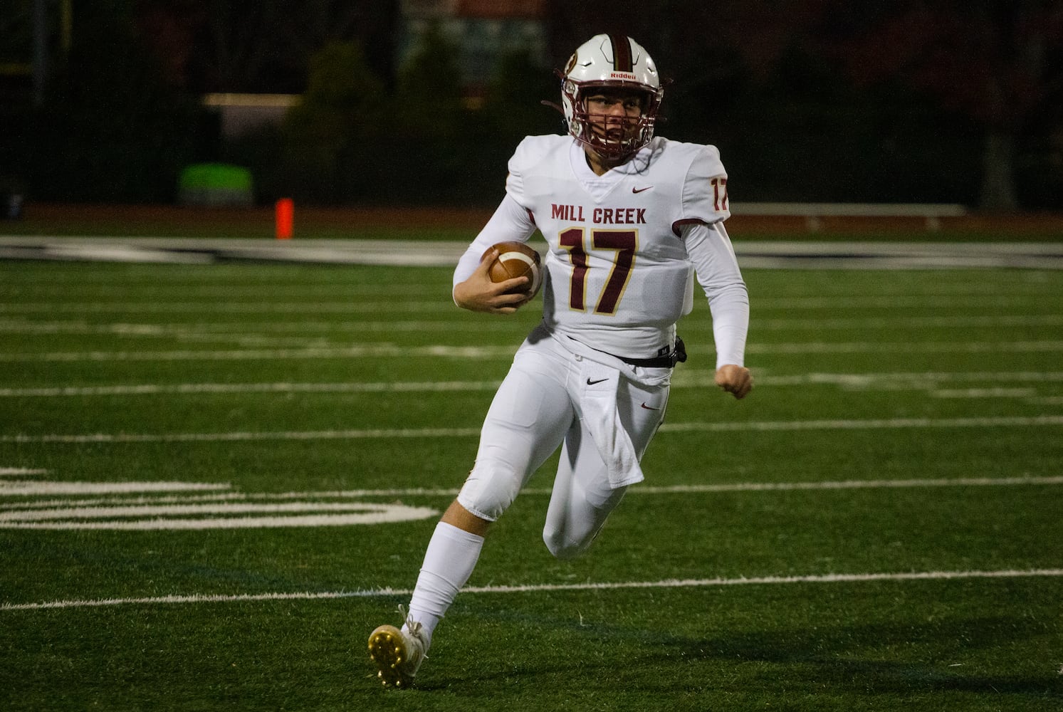 Hayden Clark, sophomore quarterback for Mill Creek, runs the ball
during the Mill Creek vs. Roswell high school football game on Friday, November 27, 2020, at Roswell High School in Roswell, Georgia. Mill Creek led Roswell 27-21 at the end of the third quarter. CHRISTINA MATACOTTA FOR THE ATLANTA JOURNAL-CONSTITUTION