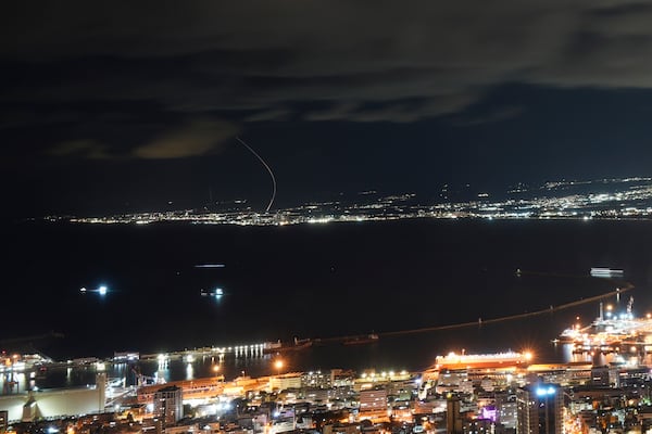 Israeli Iron Dome missile defense system fires to intercept rockets that were launched from Lebanon, as seen from Haifa, northern Israel, Tuesday, Nov. 26, 2024. (AP Photo/Francisco Seco)