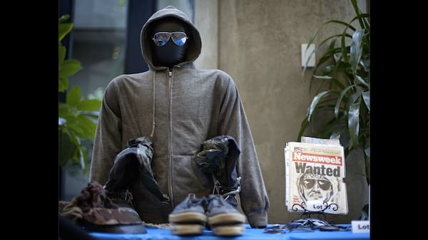 The hoodie and sunglasses used by Ted Kaczynski, also known as the "Unabomber," are displayed as Kaczynski's personal items are auctioned off online in May 2011.