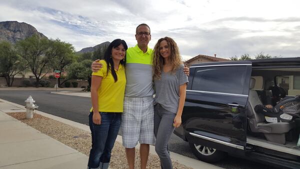 Ron Bell, center, poses with his girlfriend, Jennifer Pendley, at left, and Kerri Pastner, the wife of Georgia Tech basketball coach Josh Pastner, outside the home Bell shares with Pendley in Tucson, Arizona. Kerri Pastner visited Bell and Pendley with her three daughters. Photo courtesy of Ron Bell.