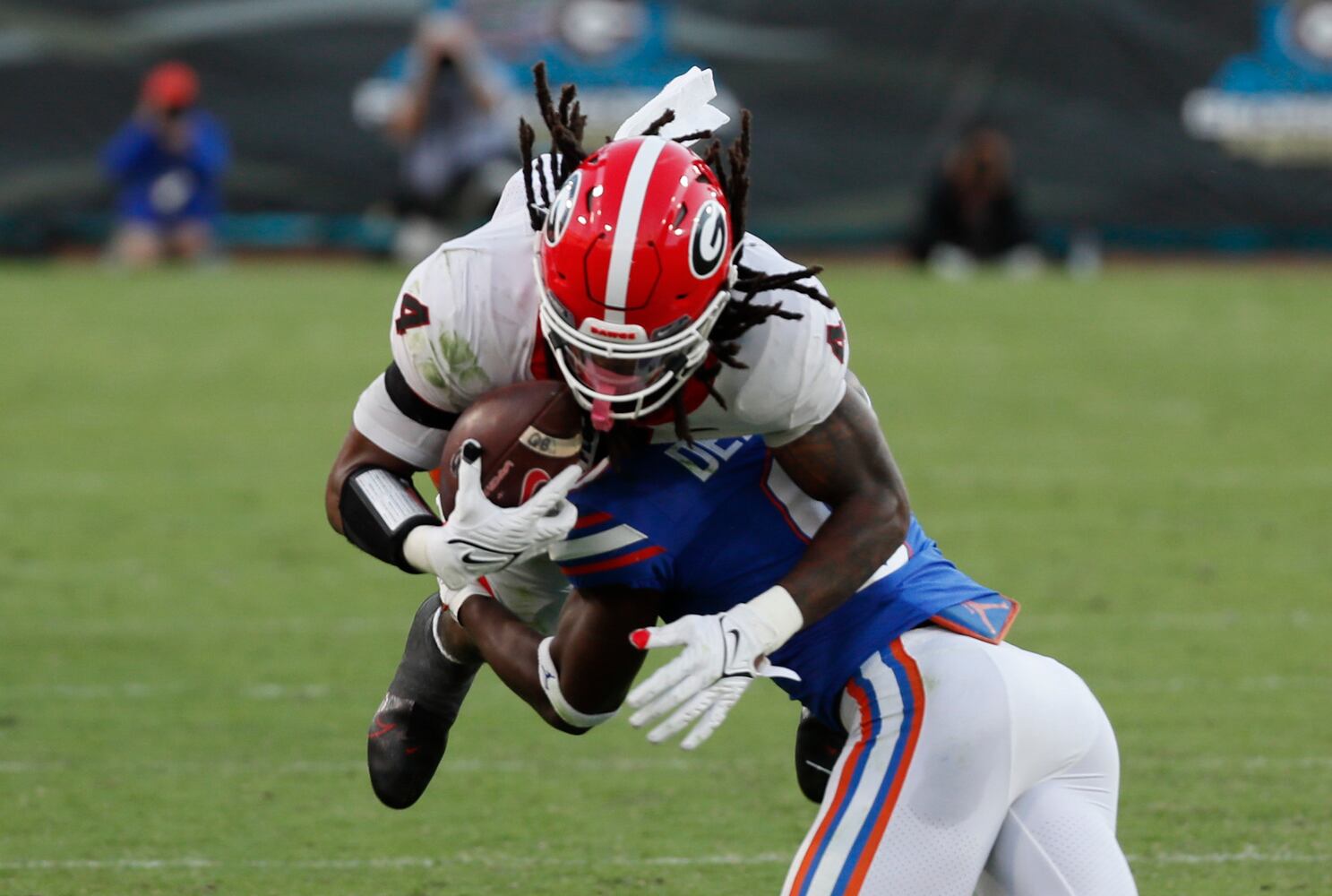 10/30/21 - Jacksonville -  Georgia Bulldogs running back James Cook (4) stopped short of a first down leading to a field goal during the second half of the annual NCCA  Georgia vs Florida game at TIAA Bank Field in Jacksonville. Georgia won 34-7.  Bob Andres / bandres@ajc.com