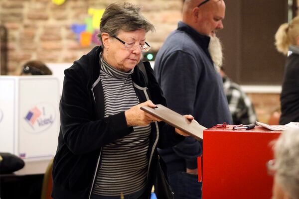 A woman casts her ballot at Canyon Lake Activity Center on Election Day, Tuesday, Nov. 5, 2024, in Rapid City, S.D. (Darsha Dodge/Rapid City Journal via AP)