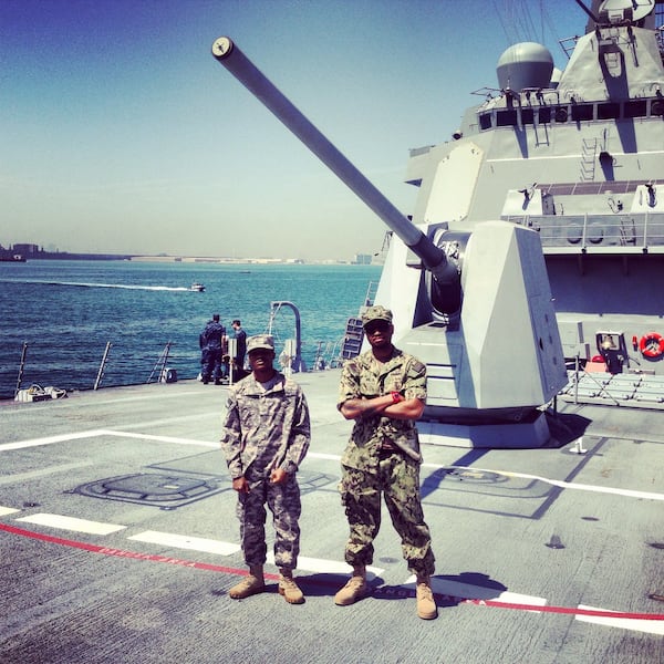 The artist Willis (right), during a counter-piracy mission in Bahrain in 2013. Contributed by Willis