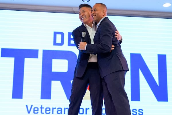 FILE - House Minority Leader Hakeem Jeffries, D-N.Y., right, greets Derek Tran during a campaign event at Golden Sea Restaurant, Oct. 12, 2024, in Anaheim, Calif. (AP Photo/Julia Demaree Nikhinson, File)