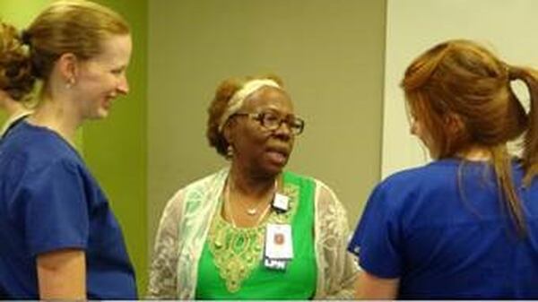 Velma Blackwell (center) bids farewell to Northside Hospital Cherokee colleagues Renee Reece and Katie Silakowski at her retirement celebration on July 19. CONTRIBUTED BY DANA JOHNSON