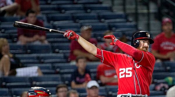 Washington Nationals first baseman Adam LaRoche follows through on a solo home run in the fourth inning of a baseball game against the Atlanta Braves early Sunday, Aug. 10, 2014, in Atlanta. (AP Photo/John Bazemore) Ol' Rochy's homer put the Nationals ahead, briefly. (John Bazemore/AP)