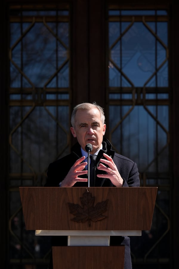 Canada Prime Minister Mark Carney speaks to media at Rideau Hall, where he asked the Governor General to dissolve Parliament and call an election, in Ottawa, Sunday, March 23, 2025. (Adrian Wyld/The Canadian Press via AP)