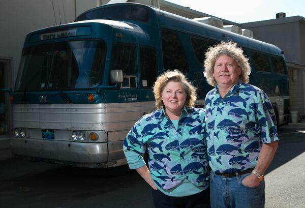 Wyatt, right, and Beverly Foster, owners of SeaVentures Scuba and Swim, stand in front of their 1968 Greyhound Buffalo Wednesday, February 10, 2016, in Alpharetta, Ga. The Fosters use their bus for scuba trips to the Florida Keys and the Florida Keys.