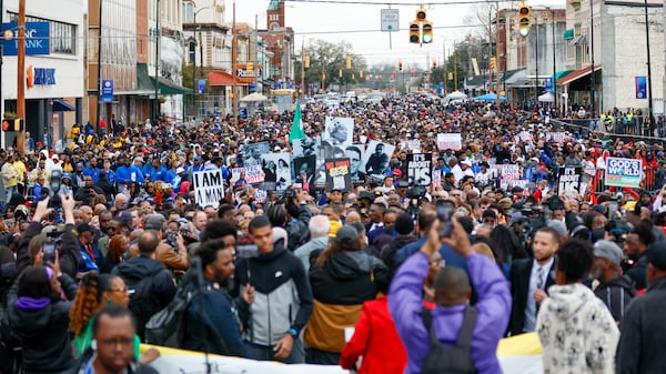 Hundreds of peaceful civil rights protestors gather at the foot of Edmund Pettus Bridge in Selma, Alabama, moments before they march on Sunday, March 9, 2025. On March 7, 1965, Hosea Williams and John Lewis led 600 civil rights activists across the Edmund Pettus Bridge in a march for voting rights. (Miguel Martinez/ AJC)
(Miguel Martinez/ AJC)