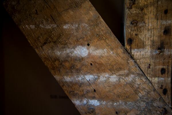 Residue from the original plaster walls of the Williamsburg Bray School on Wednesday, Oct 30, 2024 in Williamsburg, Va. (AP Photo/John C. Clark)