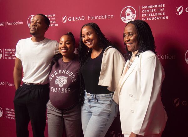 Actor Tyler James Williams (left) and Joyce Abbott (right) pose for pictures at the panel discussion Monday night. (Photo Courtesy of Elise Sampson)