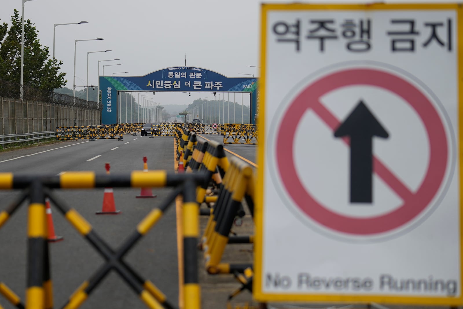 Barricades are placed near the Unification Bridge, which leads to the Panmunjom in the Demilitarized Zone in Paju, South Korea, Tuesday, Oct. 15, 2024. (AP Photo/Lee Jin-man)