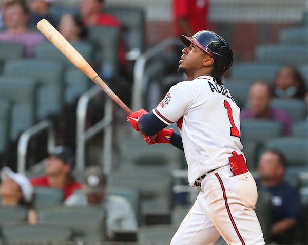 Atlanta Braves second baseman Ozzie Albies hits a solo homer against the Cincinnati Reds during the 7th inning.   “Curtis Compton / Curtis.Compton@ajc.com”