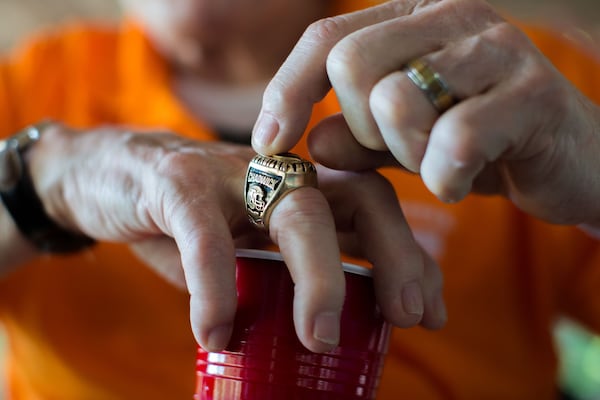 Walter Chadwick, who was a star running back at the University of Tennessee, points to his 1967 championship ring. In 1971, Chadwick was named head coach of Wills High School, but after being on the job just two weeks, an accident derailed his life. However, Chadwick’s perseverance is a source of inspiration for his friends and his former players. BRANDEN CAMP / SPECIAL