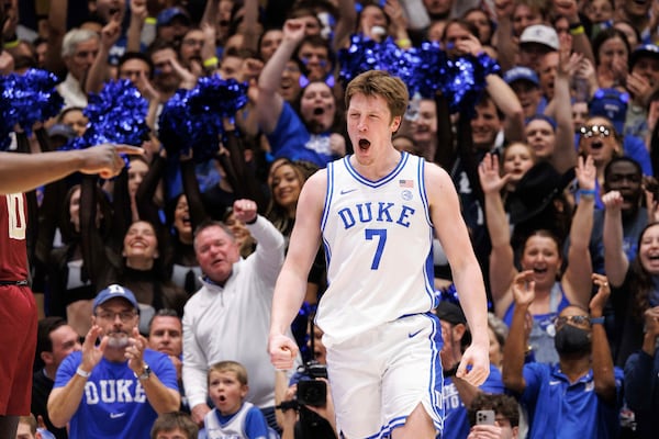 Duke's Kon Knueppel (7) reacts after scoring during the first half of an NCAA college basketball game against Florida State in Durham, N.C., Saturday, Mar. 1, 2025. (AP Photo/Ben McKeown)