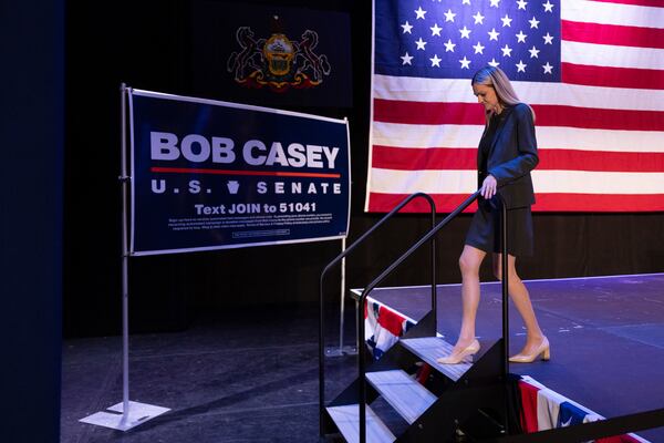 Scranton Mayor Paige Gebhardt Cognetti walks off the stage after telling supporters of Senator Bob Casey, D-Pa., that the senator would not be speaking tonight at his election night party at the Scranton Cultural Center at the Masonic Temple in Scranton, Pa. with election results too close to call on Tuesday, Nov. 5, 2024. (Christopher Dolan/The Times-Tribune via AP)