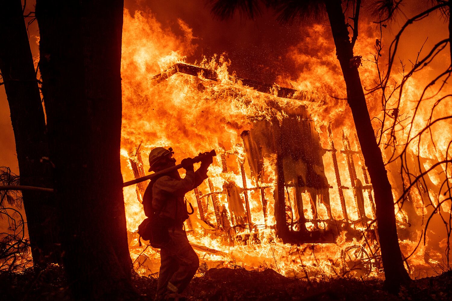 Photos: Deadly wildfires blaze through northern, southern California