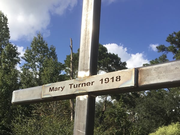 This steel cross was commissioned and erected by The Mary Turner Project in the fall of 2020 to replace a defaced Georgia Historical Society marker that detailed Turner's gruesome 1918 lynching, part of a mass 7-day lynching event of nearly 12 Black people in Brooks and Lowndes counties. CREDIT: THE MARY TURNER PROJECT