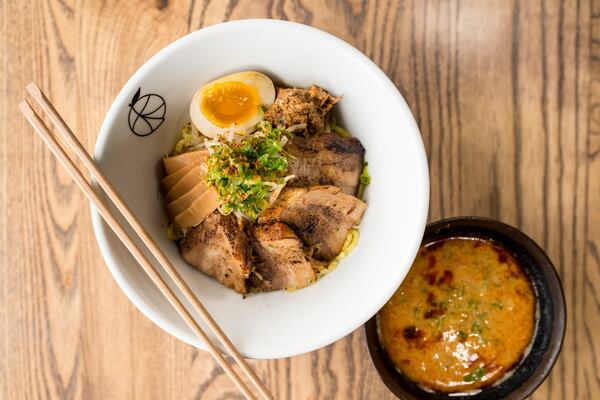 Momonoki Spicy Miso Tsukemen Ramen with pork broth, spices, seared pork belly, ramen egg, bamboo shoots, bean sprouts, and scallions. Photo credit- Mia Yakel.