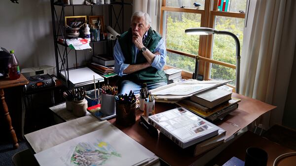 FILE - Artist Robert Seaman pauses while sketching in his room at an assisted living facility Monday, May 10, 2021, in Westmoreland, N.H. (AP Photo/Charles Krupa, File)