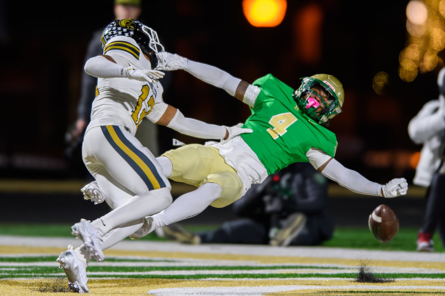 Buford wide receiver Jordan Allen goes all out but can not make the catch. (Jamie Spaar for the Atlanta Journal Constitution)