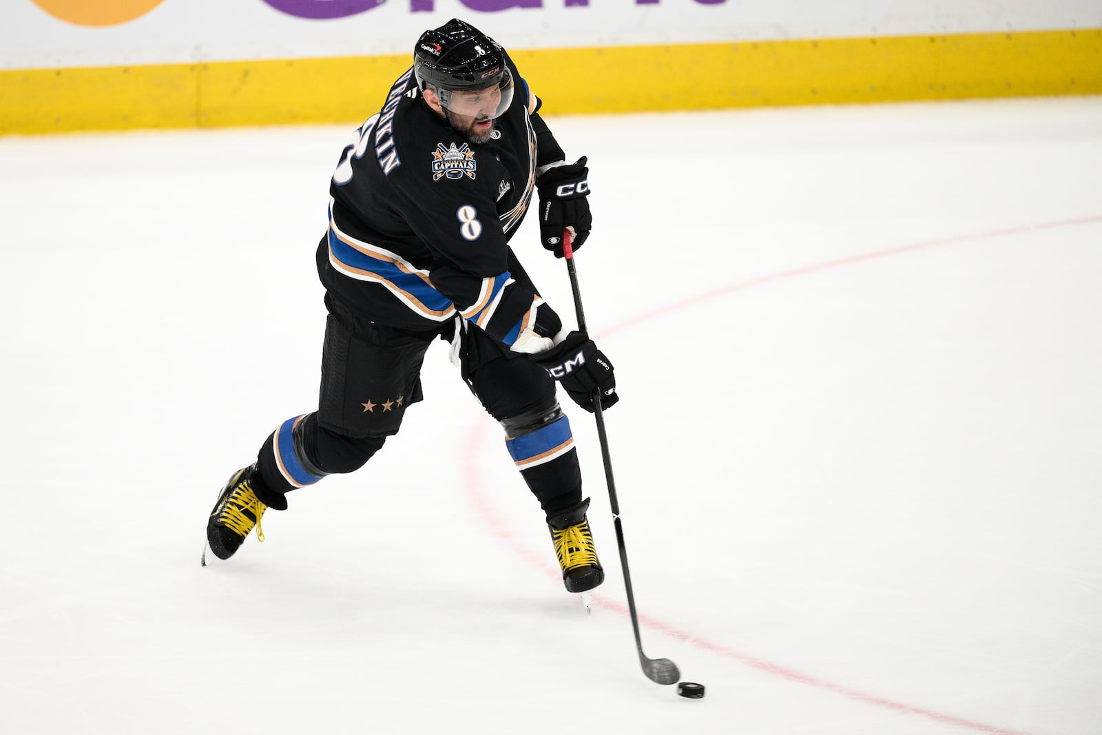 Washington Capitals left wing Alex Ovechkin (8) shoots the puck during the third period of an NHL hockey game against the Nashville Predators, Wednesday, Nov. 6, 2024, in Washington. The Capitals won 3-2. (AP Photo/Nick Wass)