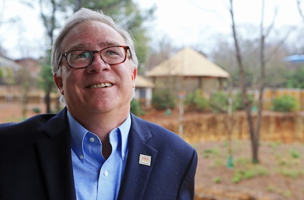 Raymond King, CEO and president of Zoo Atlanta, stands on the patio of Savanna Hall at Zoo Atlanta. The balconies and patios at the renovated facility look out into the African Savanna habitat, where elephants, giraffes, zebras and warthogs roam. Christina Matacotta/crmatacotta@gmail.com