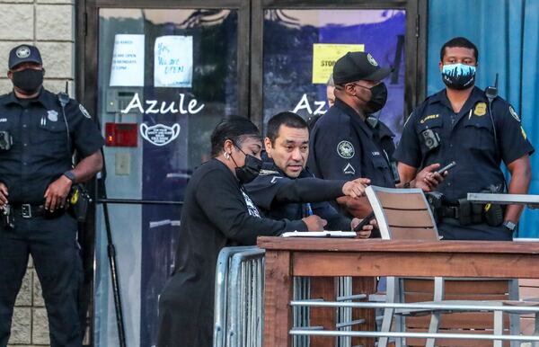 Atlanta police investigate a shooting scene in the Lindbergh area of Buckhead. 2020 was the city's deadliest year in decades, and Republicans are expected to make that a big campaign issue in next year's elections. (John Spink / John.Spink@ajc.com)


