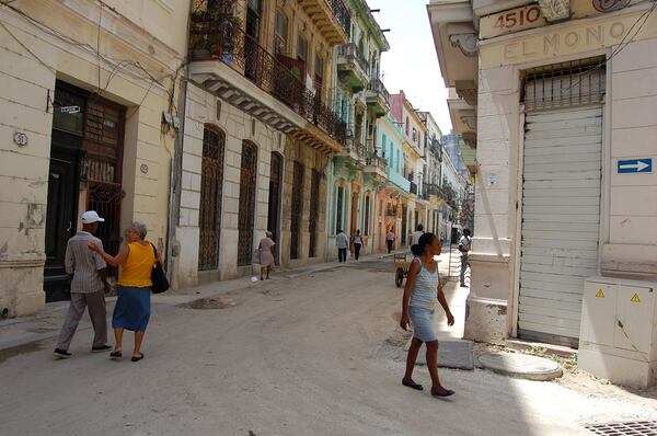 A woman walks in Old Havana on Sunday, June 28, 2015. (KATIE LESLIE / KLESLIE@AJC.COM)