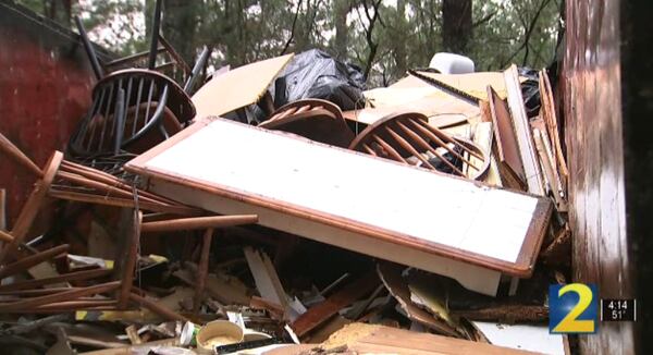 This is a photo of the furniture, appliances and other items that were found littering the house.