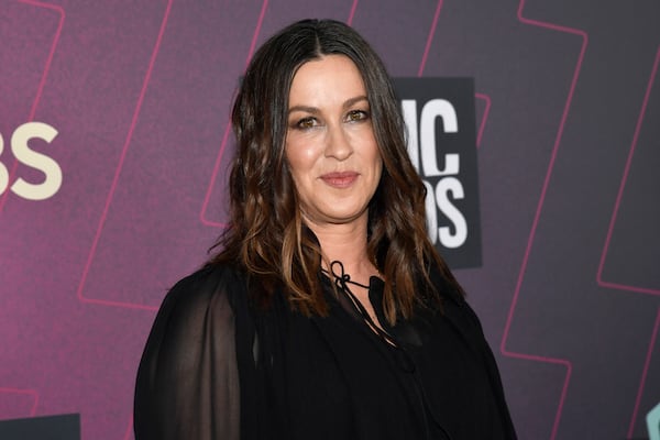 FILE - Alanis Morissette arrives at the CMT Music Awards in Austin, Texas on April 2, 2023. (Photo by Evan Agostini/Invision/AP, File)