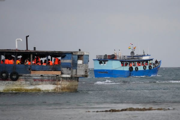 Boats transporting migrants depart the Caribbean coastal village of Miramar, Panama, for the Colombian border, Thursday, Feb. 27, 2025, as migrants return from southern Mexico after abandoning hopes of reaching the U.S. in a reverse flow triggered by the Trump administration's immigration crackdown. (AP Photo/Matias Delacroix)