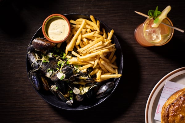 Wonderkid Steamed Mussels with wine broth, garlic, leeks, fresh herbs, Dijonaise and fries.