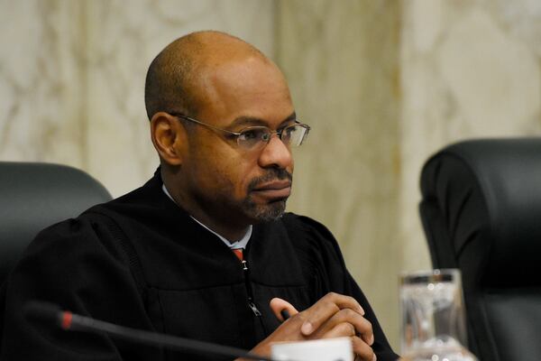 Justice Harold D. Melton listens during oral arguments at The Georgia Supreme Court. (DAVID BARNES / DAVID.BARNES@AJC.COM)