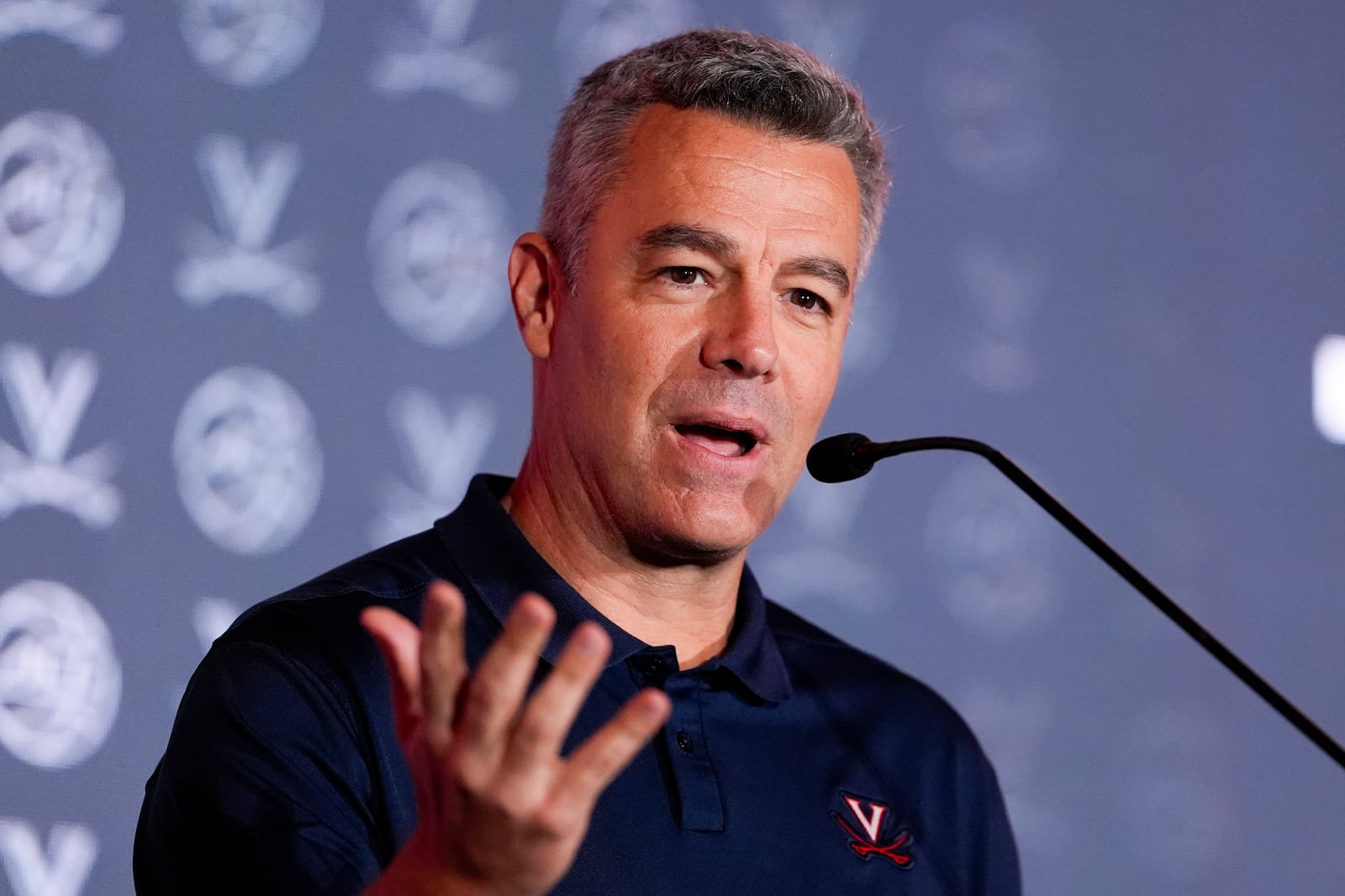 Virginia head coach Tony Bennett speaks during a ACC men's NCAA college basketball media day, Thursday, Oct. 10, 2024, in Charlotte, N.C. (AP Photo/Chris Carlson)