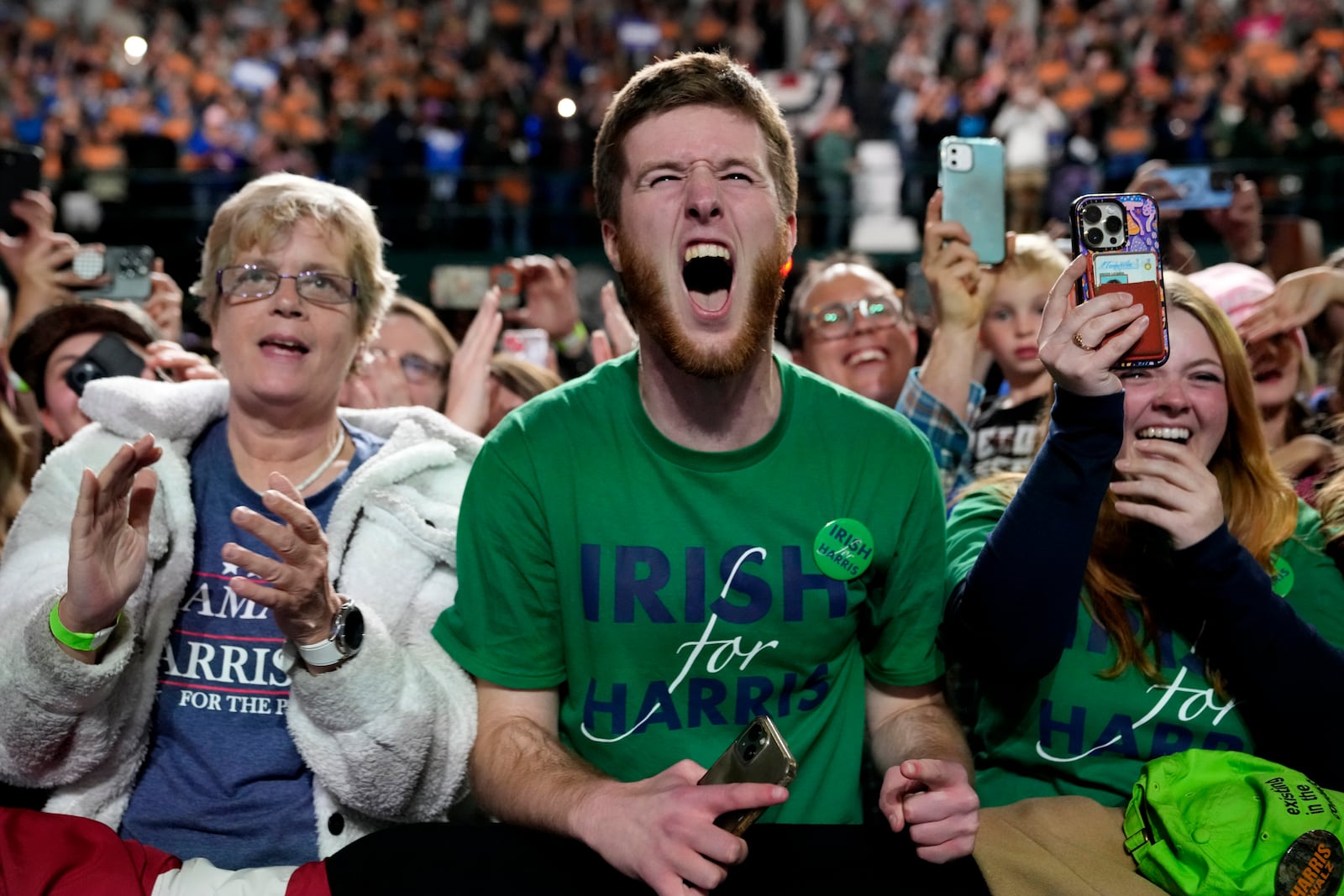 Supporters react as Democratic presidential nominee Vice President Kamala Harris speaks during a campaign rally at Jenison Field House on the campus of Michigan State University, Sunday, Nov. 3, 2024, in East Lansing, Mich. (AP Photo/Jacquelyn Martin)