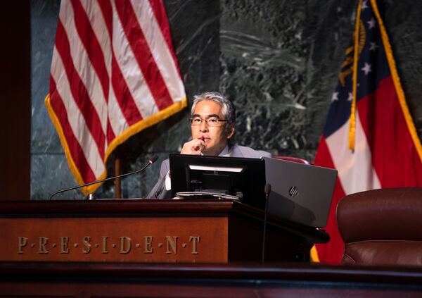 District 6 council member Alex Wan listens to public comment during the Atlanta City County FEC committee meeting on Wednesday, May 24, 2023, at City Hall in Atlanta.  Council members voted to approve funding for the new Atlanta police training center also known as Cop City. CHRISTINA MATACOTTA FOR THE ATLANTA JOURNAL-CONSTITUTION.