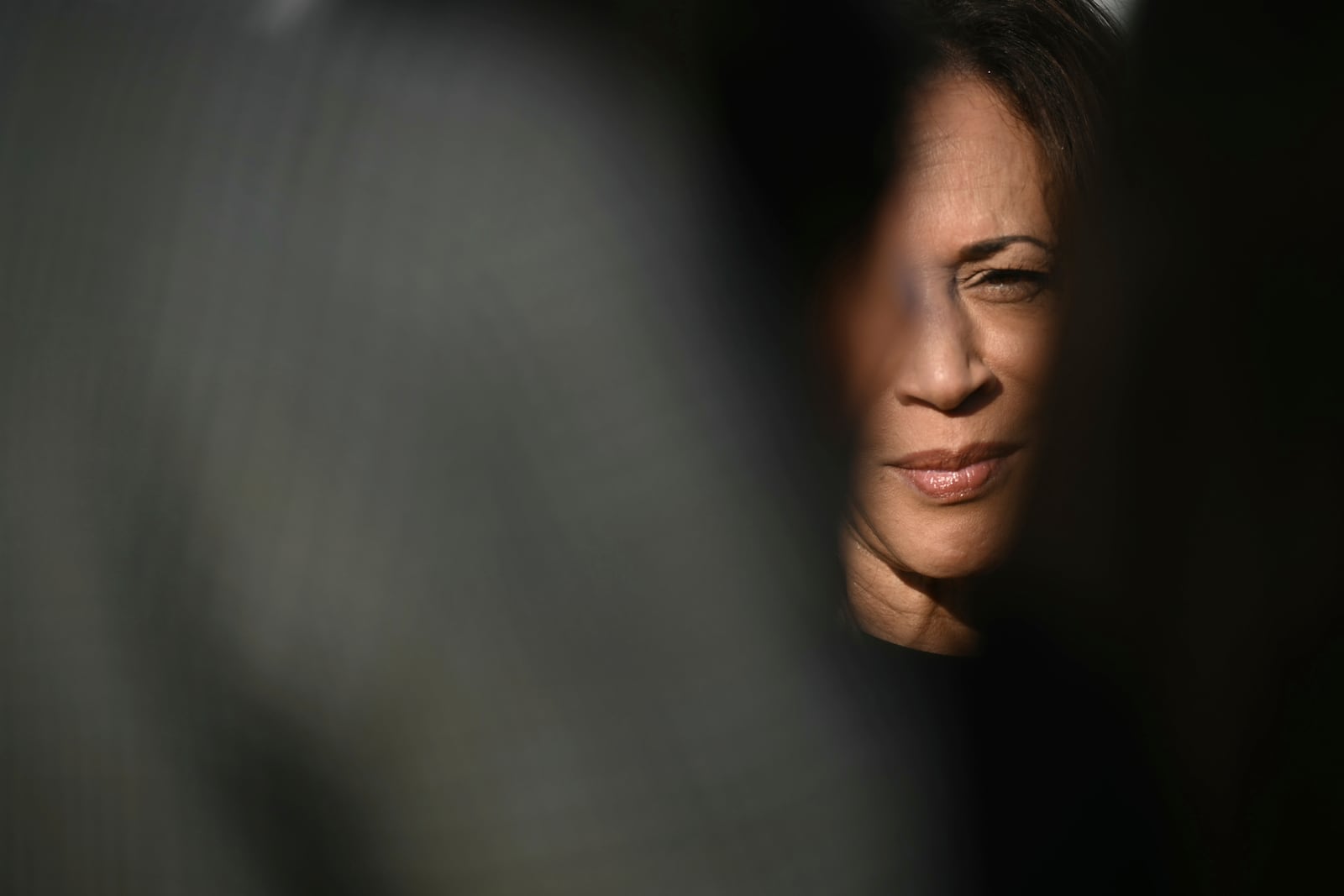 Democratic presidential nominee Vice President Kamala Harris speaks to the press before boarding Air Force Two at Joint Base Andrews, Md., Saturday, Oct. 12, 2024, en route to North Carolina for a campaign event. (Brendan Smialowski/Pool via AP)