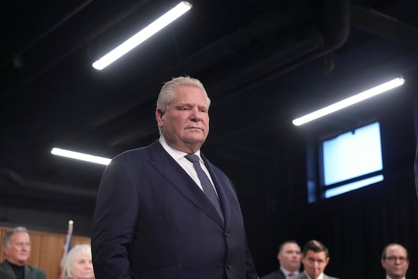 Ontario Premier Doug Ford attends a news conference at Queen's Park Legislature in Toronto on Thursday Dec. 12, 2024. (Chris Young/The Canadian Press via AP)