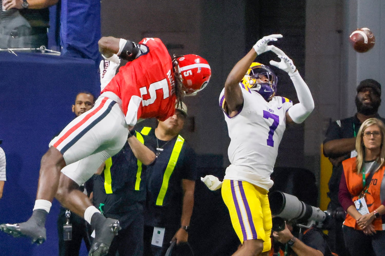 Georgia Bulldogs defensive back Kelee Ringo (5) blocks an attempted pass to LSU Tigers wide receiver Kayshon Boutte (7) during the first half of the SEC Championship Game at Mercedes-Benz Stadium in Atlanta on Saturday, Dec. 3, 2022. (Bob Andres / Bob Andres for the Atlanta Constitution)