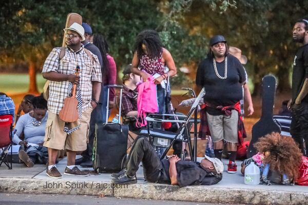 Hundreds of “American Idol” audition candidates lined up in the heat outside Piedmont Park on Tuesday. JOHN SPINK / JSPINK@AJC.COM