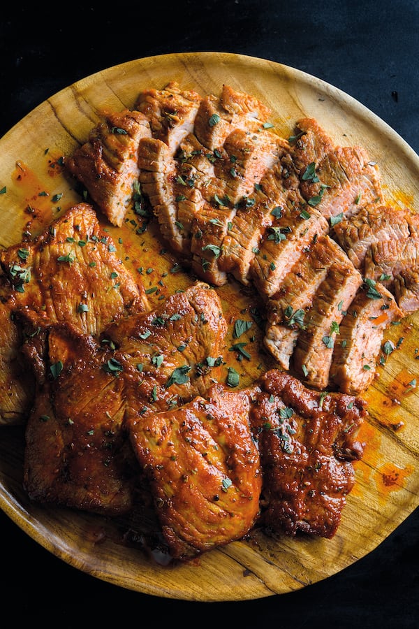 Seared Pork Tenderloin with Smoked Paprika and Oregano, from "Milk Street: Tuesday Nights Mediterranean" (Voracious; 2021; $35). Courtesy of Connie Miller, CB Creatives Inc.