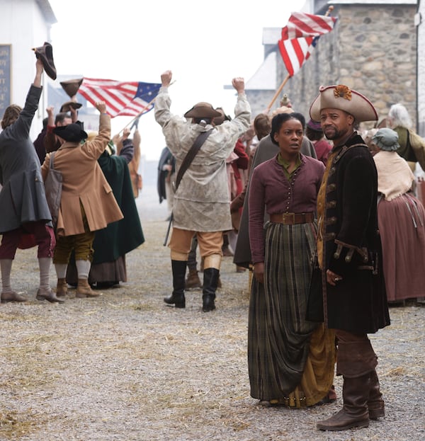 L-R_The_Book_of_Negroes_Aminata_Diallo_(Aunjanue_Ellis)_and_Sam_Fraunces_(Cuba_Gooding_Jr.).jpg