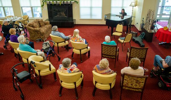 Kate Lauterbach sings for residents at Sanford Estates in Roswell. The 17-year-old Marist student has a passion for singing and is channeling it into a day-brightener for seniors. PHIL SKINNER FOR THE ATLANTA JOURNAL-CONSTITUTION.