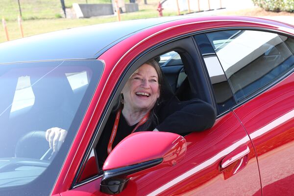 Reporter Mary Welch gained confidence after driving a Porsche. Tyson Horne / tyson.horne@ajc.com