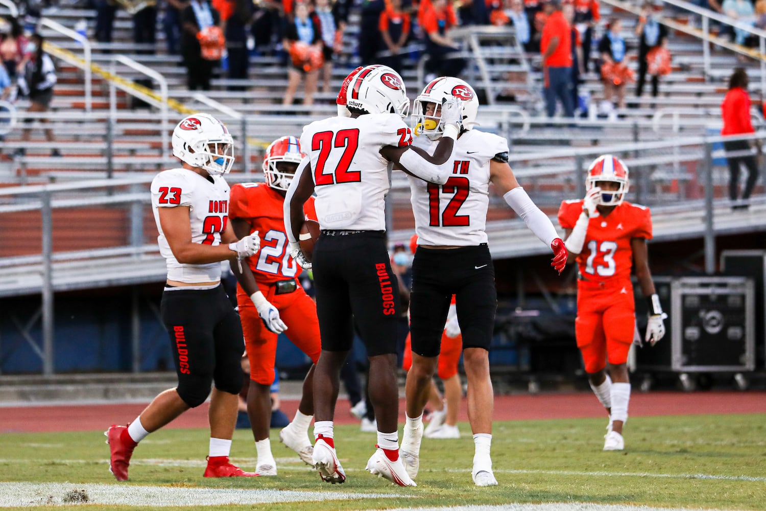 North Gwinnett running back Brinston Williams (22) celebrates with North Gwinnett wide receiver Marek Briley (12) after Williams’ touchdown during a GHSA 7A high school football game between the North Gwinnett Bulldogs and the Parkview Panthers at Parkview High School in Lilburn, Ga., on Friday, Sept. 3, 2021. (Casey Sykes for The Atlanta Journal-Constitution)