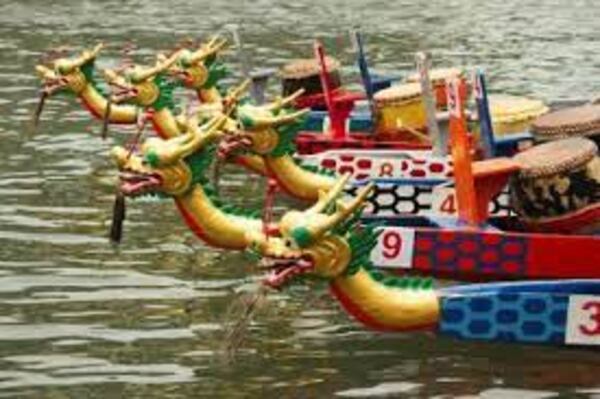 Watch colorful dragon boats on the water in Acworth.