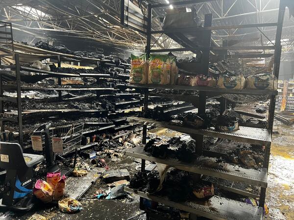 A massive fire in the retail area of the Peachtree City Walmart Supercenter scorched large sections of the store and caused partial roof collapse.