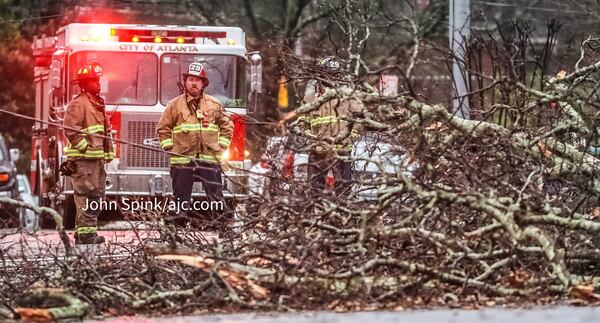 Authorities blocked Westminster Drive at The Prado in Midtown after a tree fell during Monday morning's downpours, knocking down power lines.