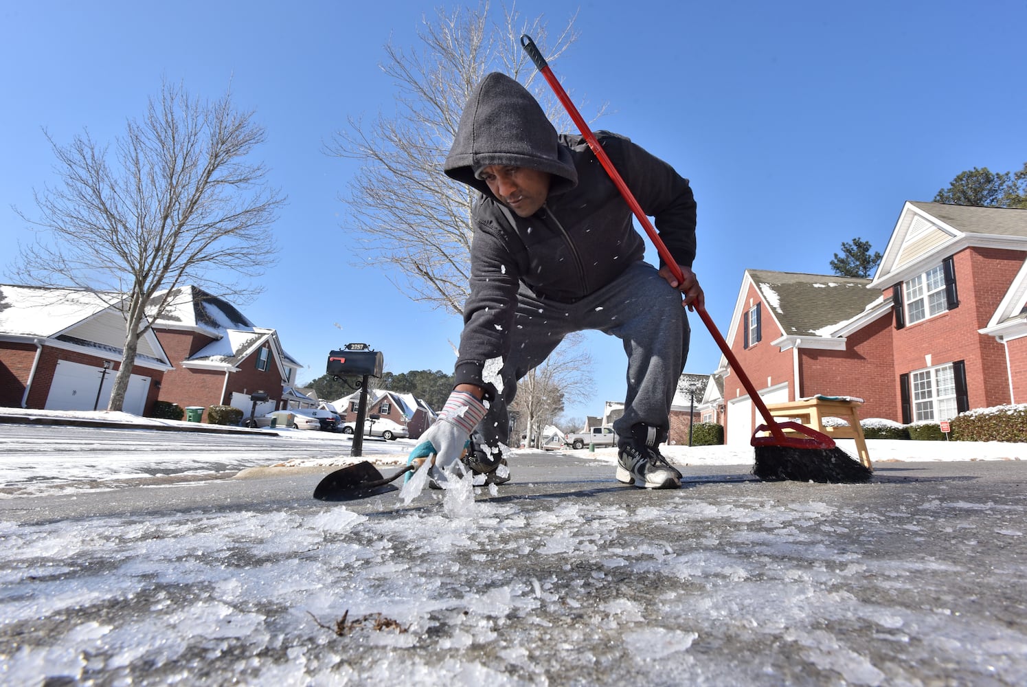 Photos: Frigid cold and snow move in to metro Atlanta